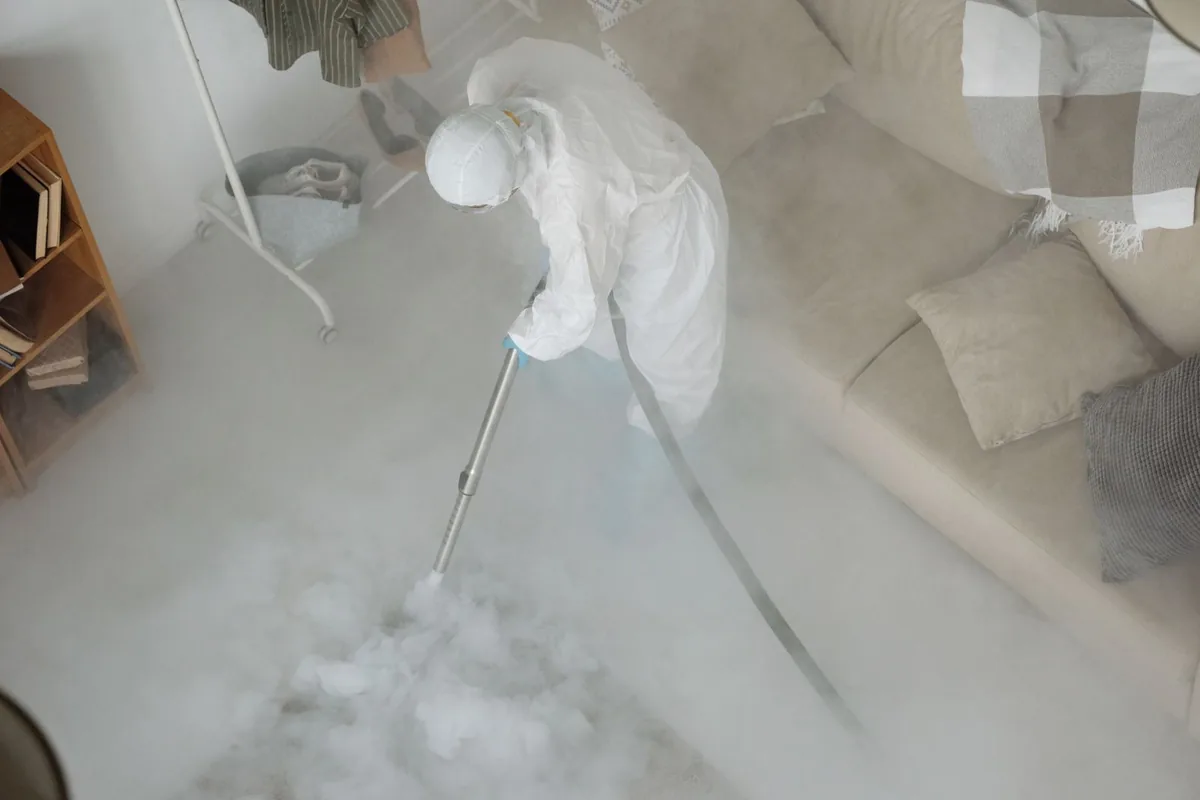 Biohazard cleanup technician in protective equipment, Overbrook, Philadelphia, PA
